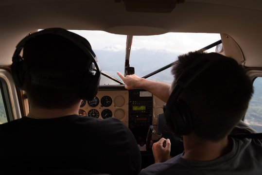 Pilots talking to each other while flying