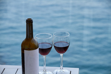 wine bottle with two glasses