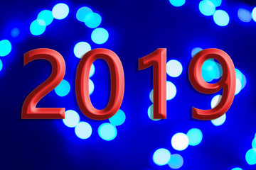 new year and Christmas celebration  concept of blue and white illumination and background surface with red numbers of "2019"