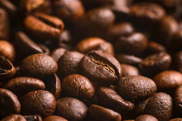 The texture of roasted coffee beans. Macro image