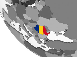 Romania with flag on globe
