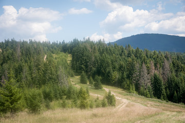 Fototapeta na wymiar View of the beautiful mountain range and the beautiful sky (Carpathians, Ukraine).