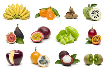 Different fresh Thai tropical fruits whole and cut in half isolated on white background, healthy food, diet nutrition 