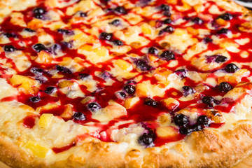 Fruit sweet pizza. Pizza for dessert. .Pizza with sweet berries