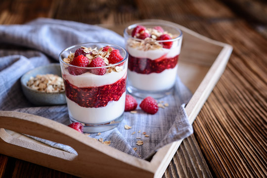 Cranachan - traditional dessert with whipped cream, oatmeal and raspberries
