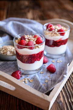 Cranachan - traditional dessert with whipped cream, oatmeal and raspberries