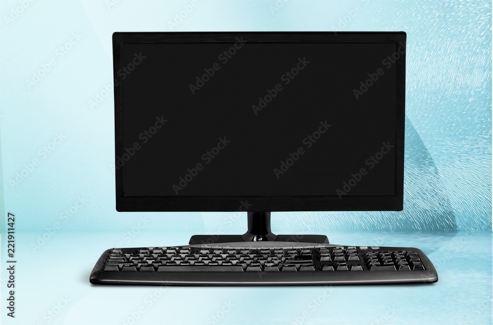 Poster desktop computer and keyboard on background