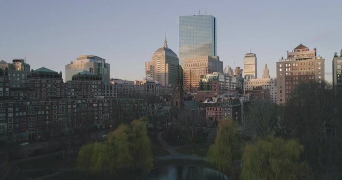 Pedestal Down Aerial Shot of Downtown Boston and Common Park 