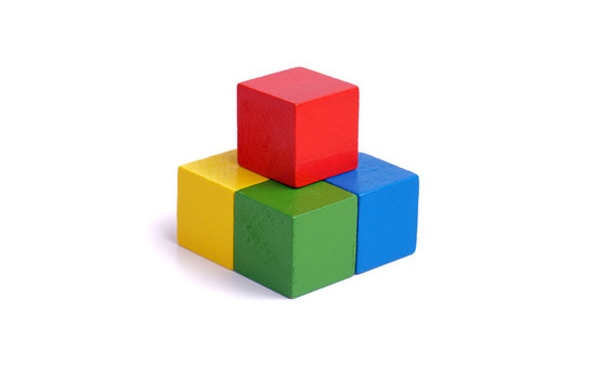 multi colored wooden block on white background