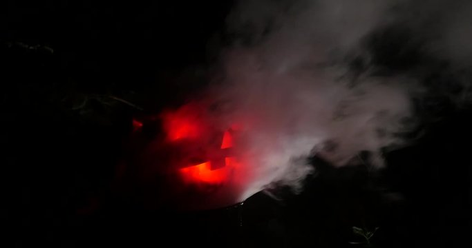 Red eye pumpking in Halloween Horror Scene