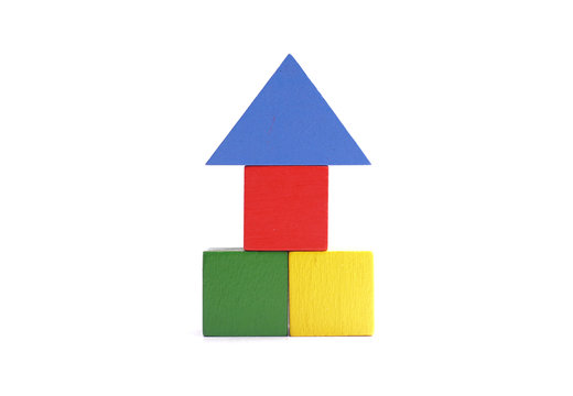 multi colored wooden block on white background