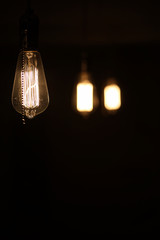Lamps with tungsten filament. Edison's light bulb. Filament fila