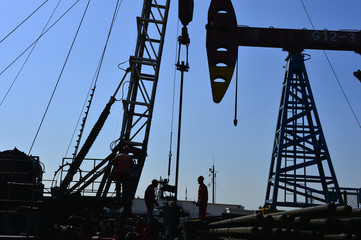 The oil workers in the job