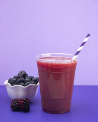 Berry Smoothie in a Plastic Disposable Cup