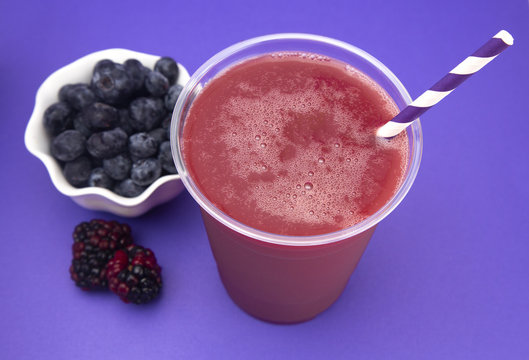 Berry Smoothie in a Plastic Disposable Cup
