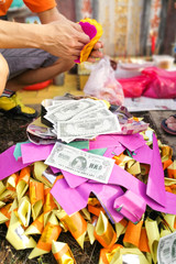 Burning paper money and other offerings during qingming in Malaysia