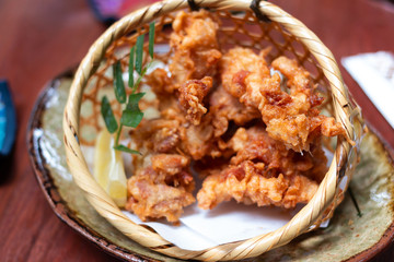 Fried chicken is Herbal mixtures In the basket made of bamboo
