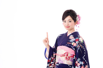 portrait of young asian woman wearing purple kimono on white background