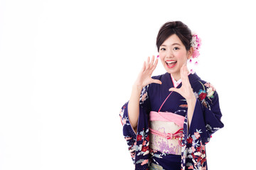 portrait of young asian woman wearing purple kimono on white background