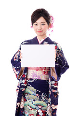 portrait of young asian woman wearing purple kimono on white background