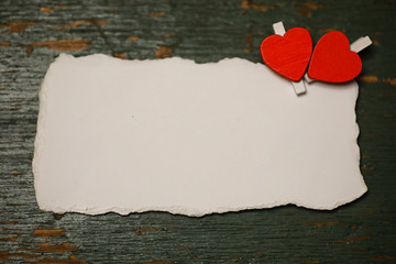 white sheet paper love notes and heart shape