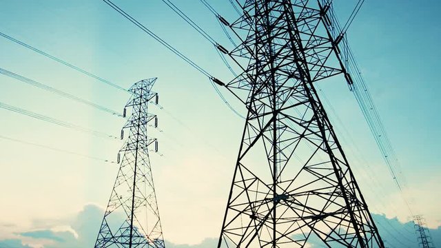 Green energy concept, Electricity station, Close up high voltage power lines at sunset. electricity distribution station. high voltage electric transmission pylon silhouetted  tower with 4k resolution