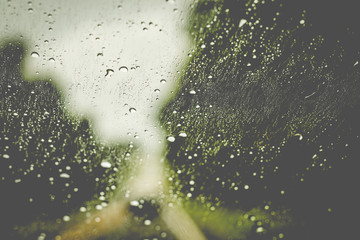 Obraz premium Raindrops on a Car Windshield