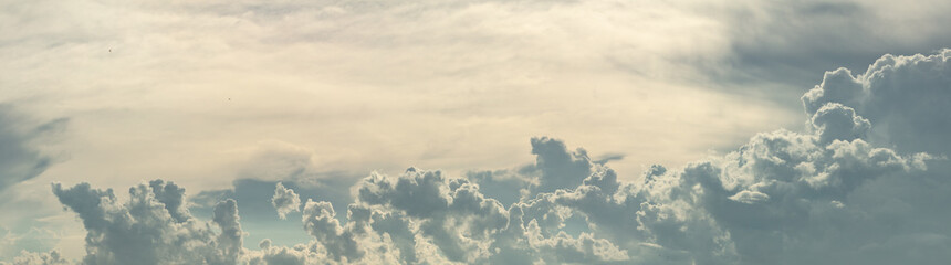 vibrant cloudscape in the setting sun panorama