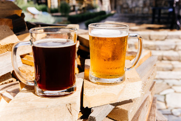 Glass of a tasty home made beer on table