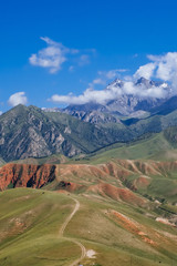 Mountains and path on meadows in Qinghai, China