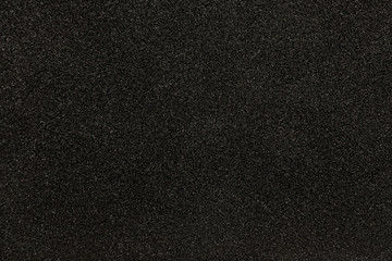 Black synthetic sponge texture for background - obrazy, fototapety, plakaty