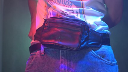 Putting a fanny pack on during the 80's 90's and looking cool and proud wearing this around the waist