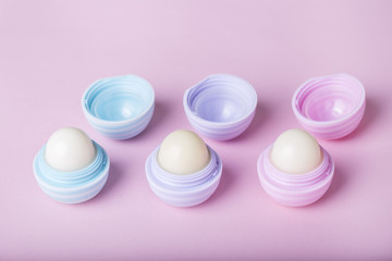 Different lip care balms. Lip care concept. Top view