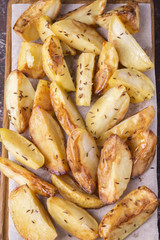 Fried potato with cumin. Top view. Closeup