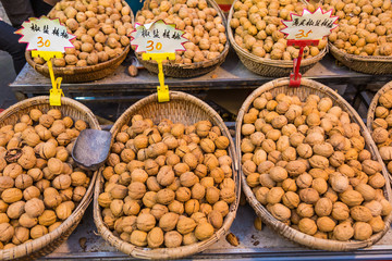 Walnuts sales at famous Muslim Street market in Xian, China