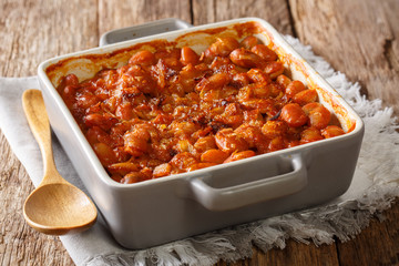Vegetarian Balkan food prebranac baked beans with onions close-up in baking dish. horizontal