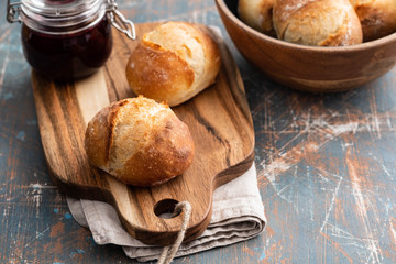Freshly baked bread on dark gray kitchen table, copy space.