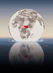 South Sudan on globe in water