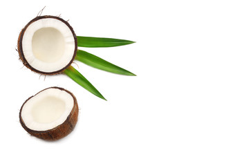 Coconut with green leaves isolated on white background. top view