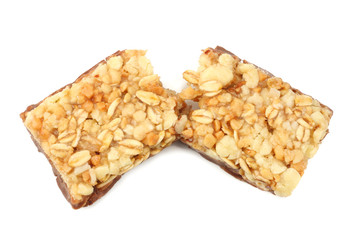 Healthy granola bar ( muesli bar or cereal bar ) isolated on white background. top view