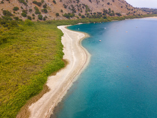 Aerial view to beautiful Lake Kournas in Crete island. Photo from drone. Greece.