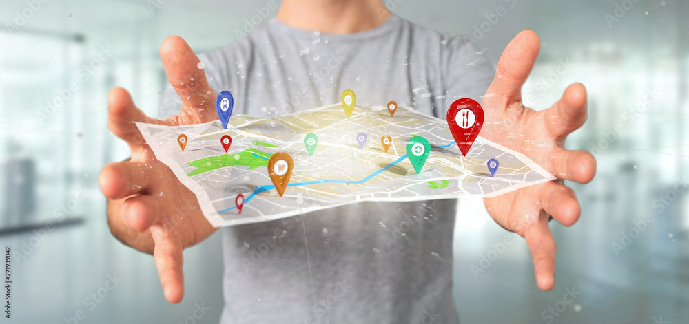 Poster man holding a 3d rendering pin holder on a map