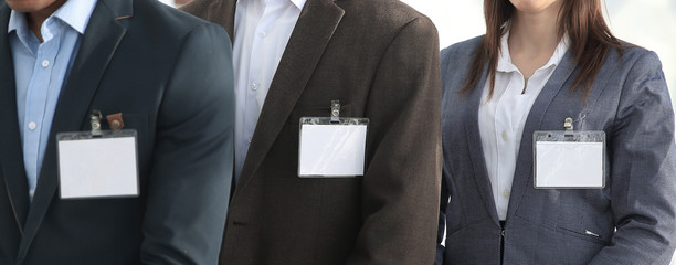 group of business people with blank badges