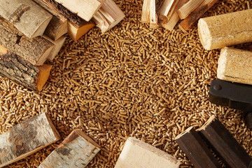 Background of mounds of pegs and chopped logs
