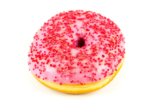 fresh sweet pink donut with red sprinkles