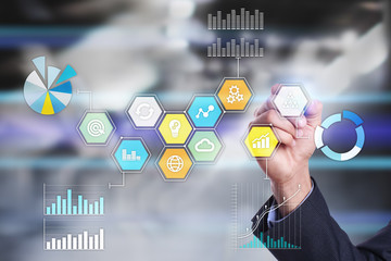 Colored applications icons and graphs on virtual screen. Business, internet and technology concept.