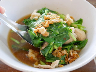 Close up of Thai style vegetable stew pork soup ( Gaw Lao Moo Tun ) - delicious and healthy street food in Thailand