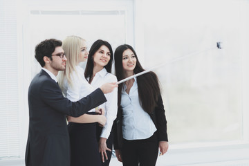 Group of Business People Enjoy Taking Selfie with Team Work after Meeting in Office