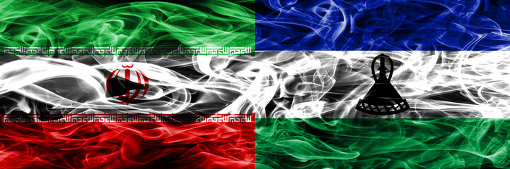 Iran vs Lesotho smoke flags placed side by side. Thick colored silky smoke flags of iranian and...