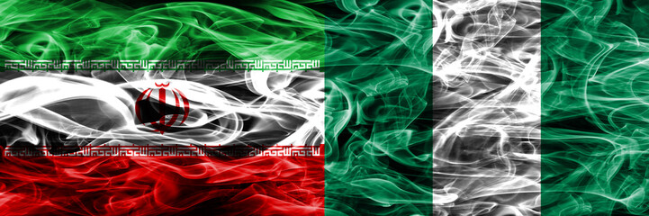 Iran vs Nigeria smoke flags placed side by side. Thick colored silky smoke flags of iranian and...